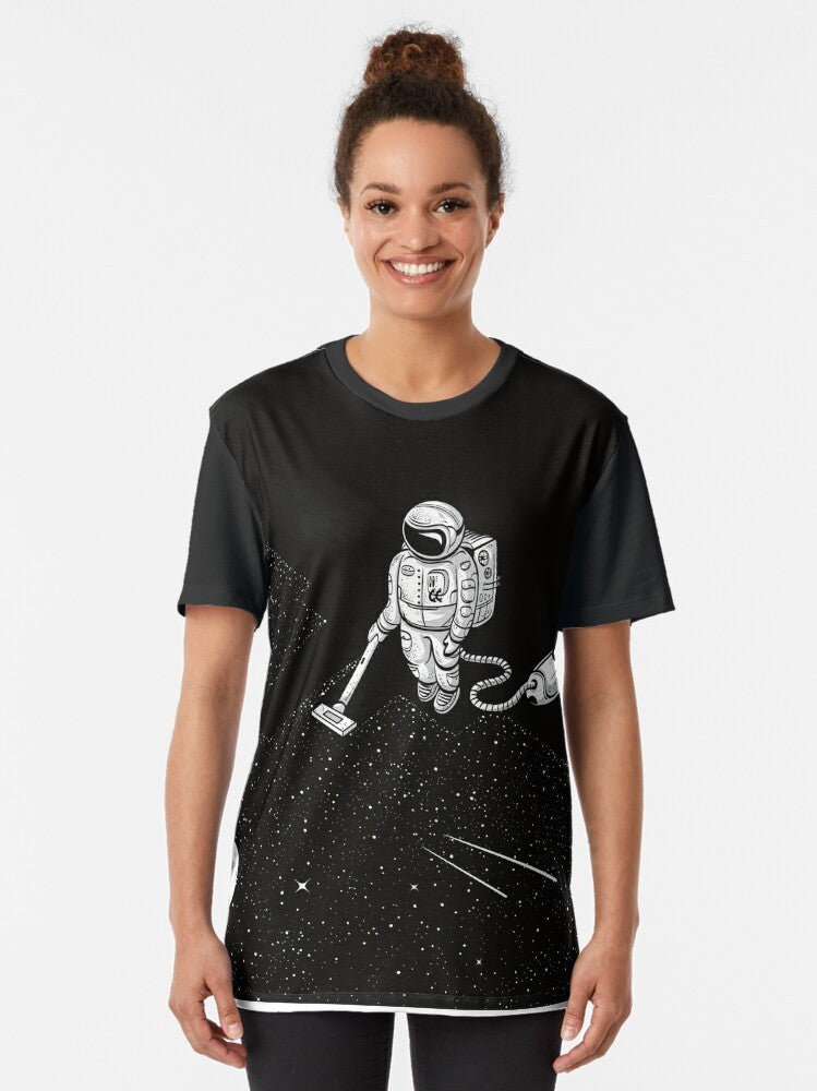 Space Cleaner Graphic T-Shirt featuring an astronaut cleaning the galaxy - Women