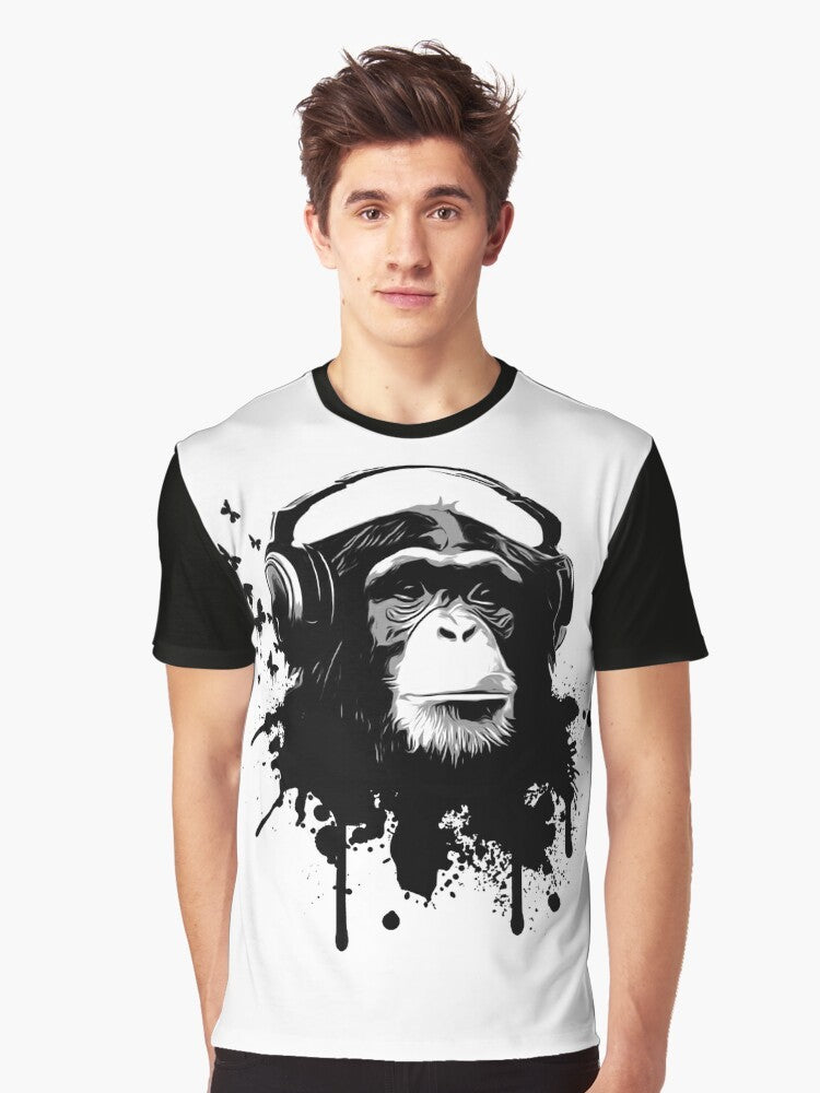 Monkey Business graphic t-shirt featuring a chimpanzee wearing headphones with a splash of butterflies and graffiti-style graphics - Men