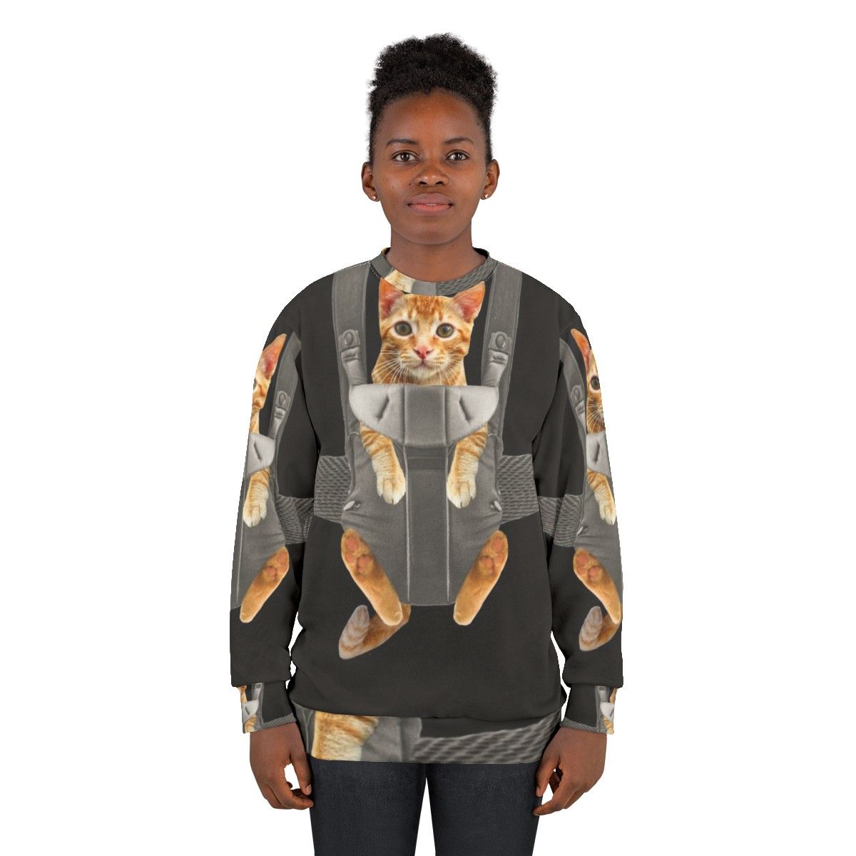 Monty the cat wearing a baby carrier on a sweatshirt - women