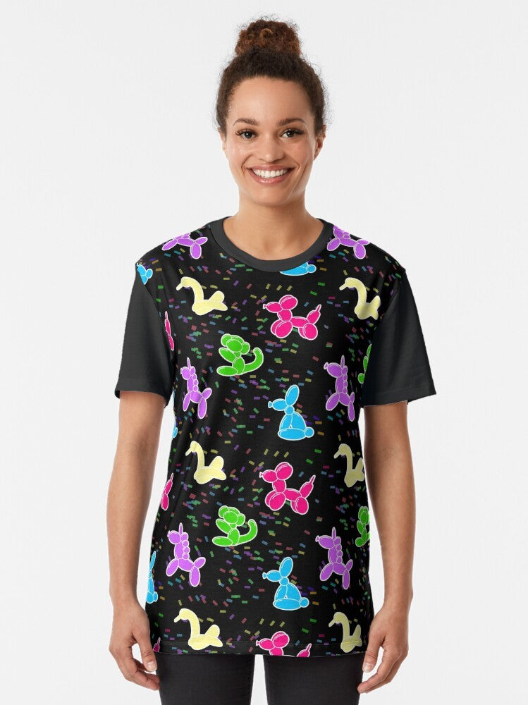 Colorful balloon animals including a dog and unicorn on a black graphic t-shirt - Women