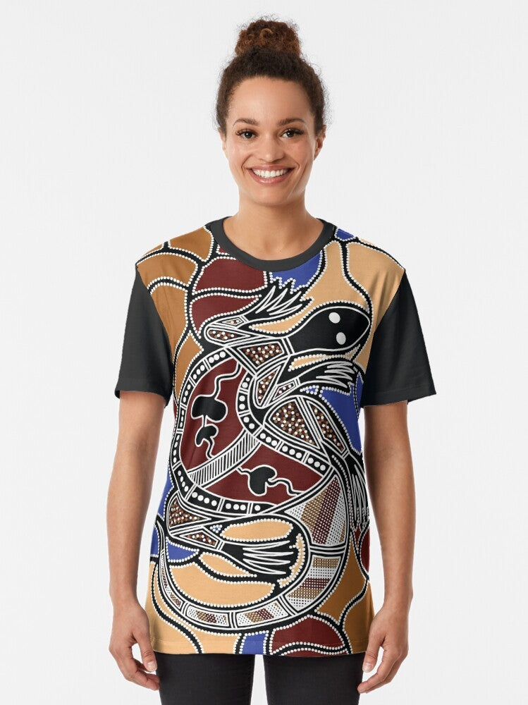 Authentic Aboriginal art t-shirt with a goanna (lizard) dreaming graphic design - Women