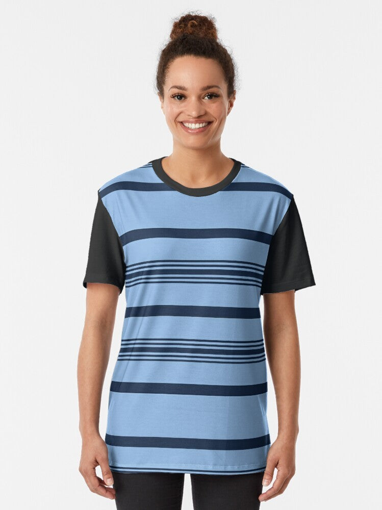 A blue and white striped graphic t-shirt with the text "Dear Evan Hansen" printed on the front. - Women