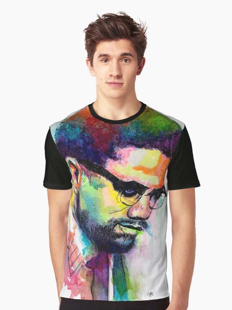 Man wearing a black t-shirt with a graphic design of Malcolm X, a prominent civil rights activist - Men