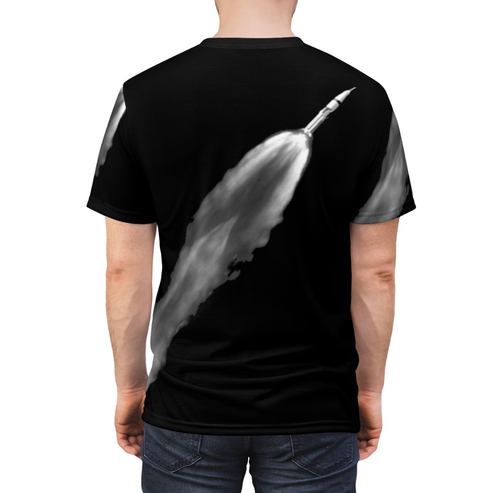 Space-themed graphic t-shirt design featuring a rocket launch - men back