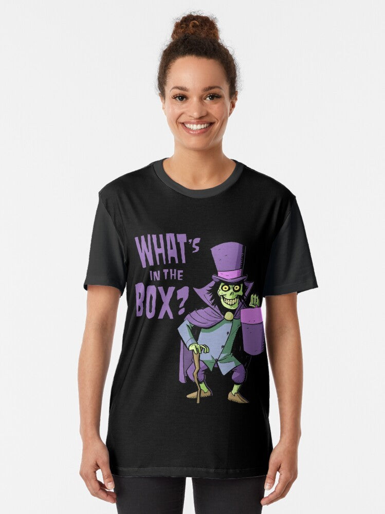 A graphic t-shirt design featuring a haunted mansion and a mysterious hatbox, with spooky and creepy elements. - Women