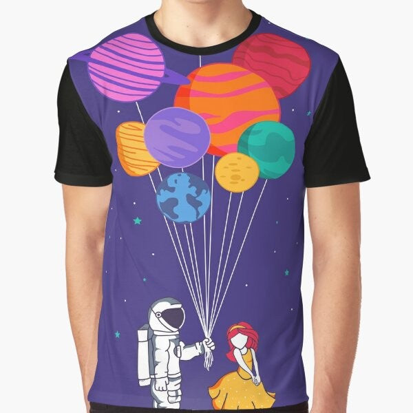 Graphic t-shirt featuring a couple in space with planets, stars, and a galaxy in the background