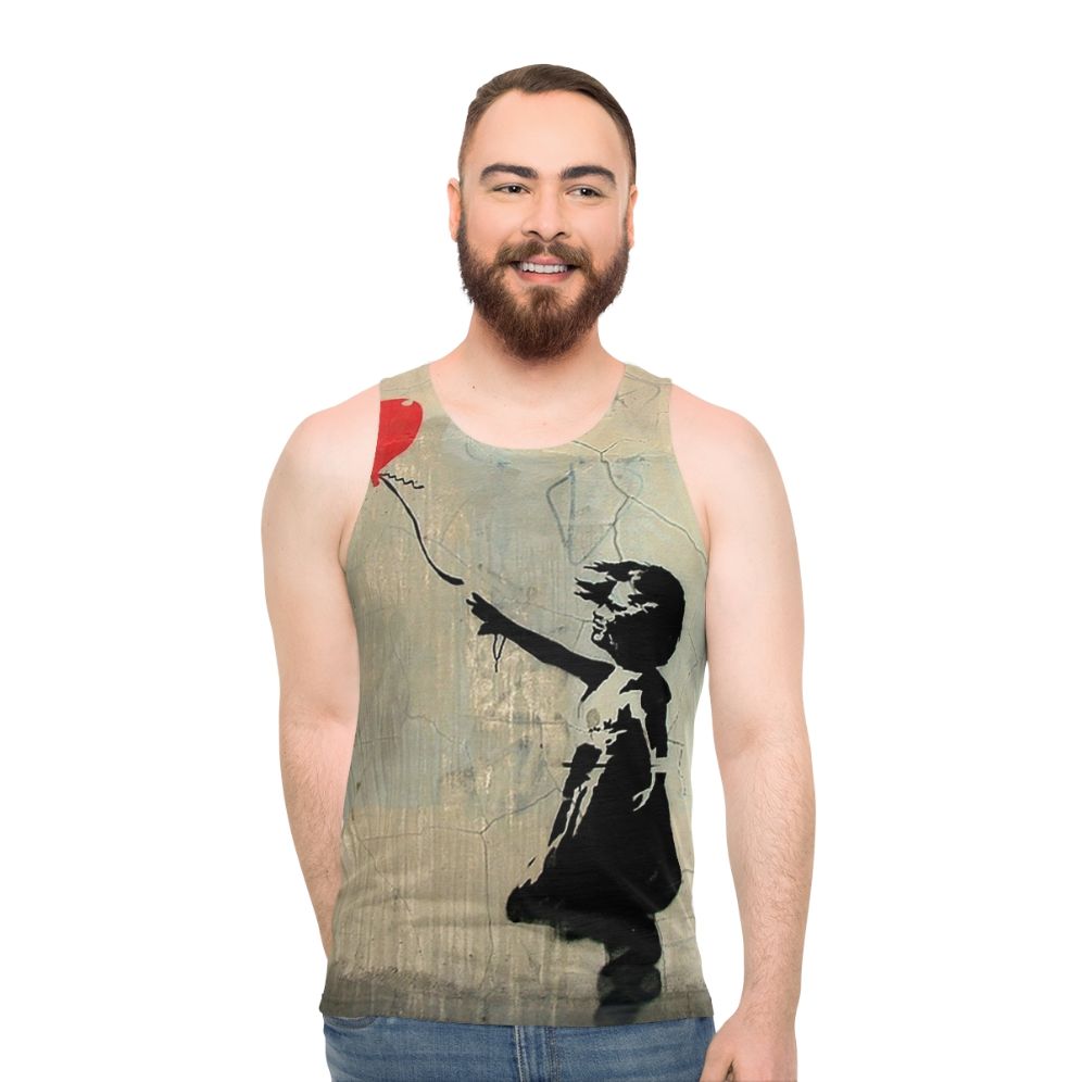 Banksy-inspired red tank top with heart balloon graphic - men