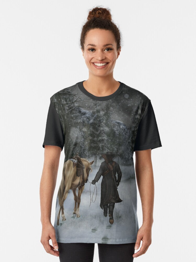 A graphic t-shirt featuring the iconic Red Dead Redemption game imagery, including a horse, outlaw, and western landscape. - Women