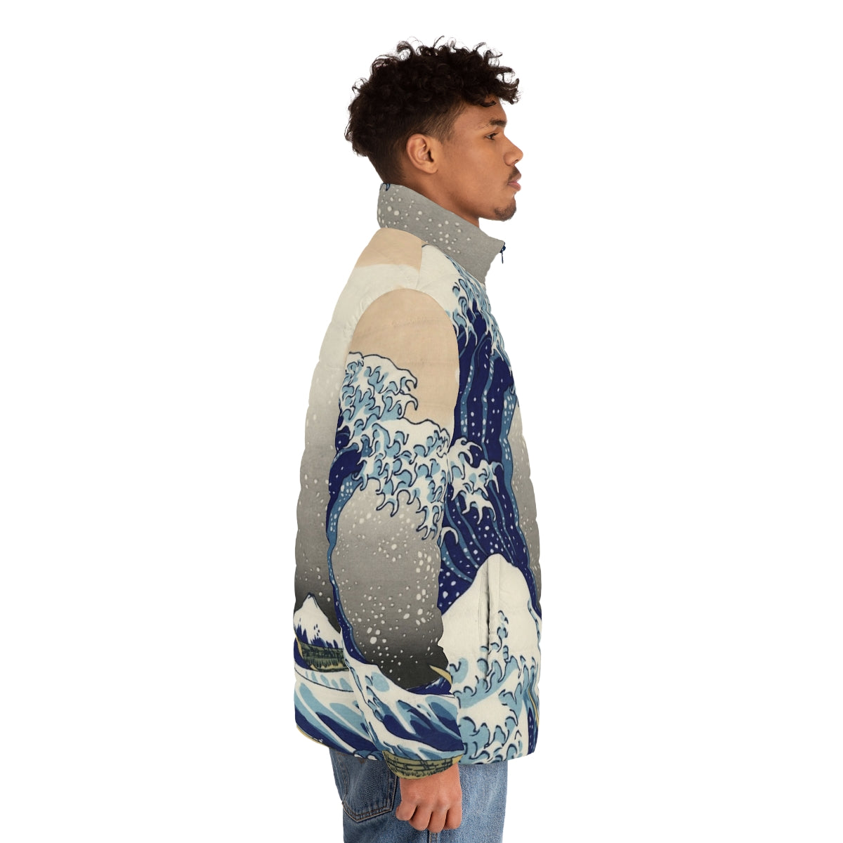 Person wearing a black puffer jacket with the famous 'Great Wave off Kanagawa' design by Hokusai - men side right