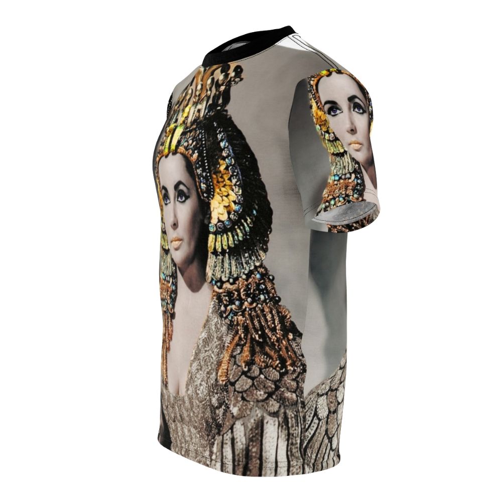 A person wearing a T-shirt featuring a stylized portrait of Elizabeth Taylor as Cleopatra in ancient Egyptian attire. - men left