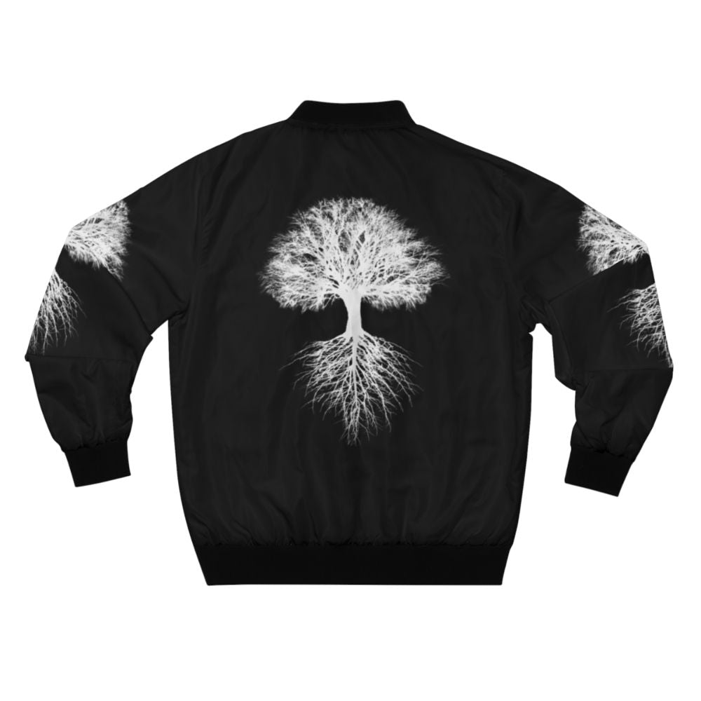 A green and blue bomber jacket with a tree of life design, representing nature and the environment. - Back