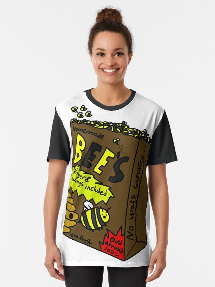 Illustration of a bumblebee eating from a paper bag on a black and yellow graphic t-shirt - Women