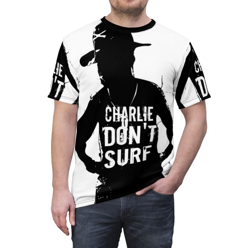 Vintage graphic t-shirt featuring the quote "Charlie Don't Surf" from the classic war movie Apocalypse Now - men front