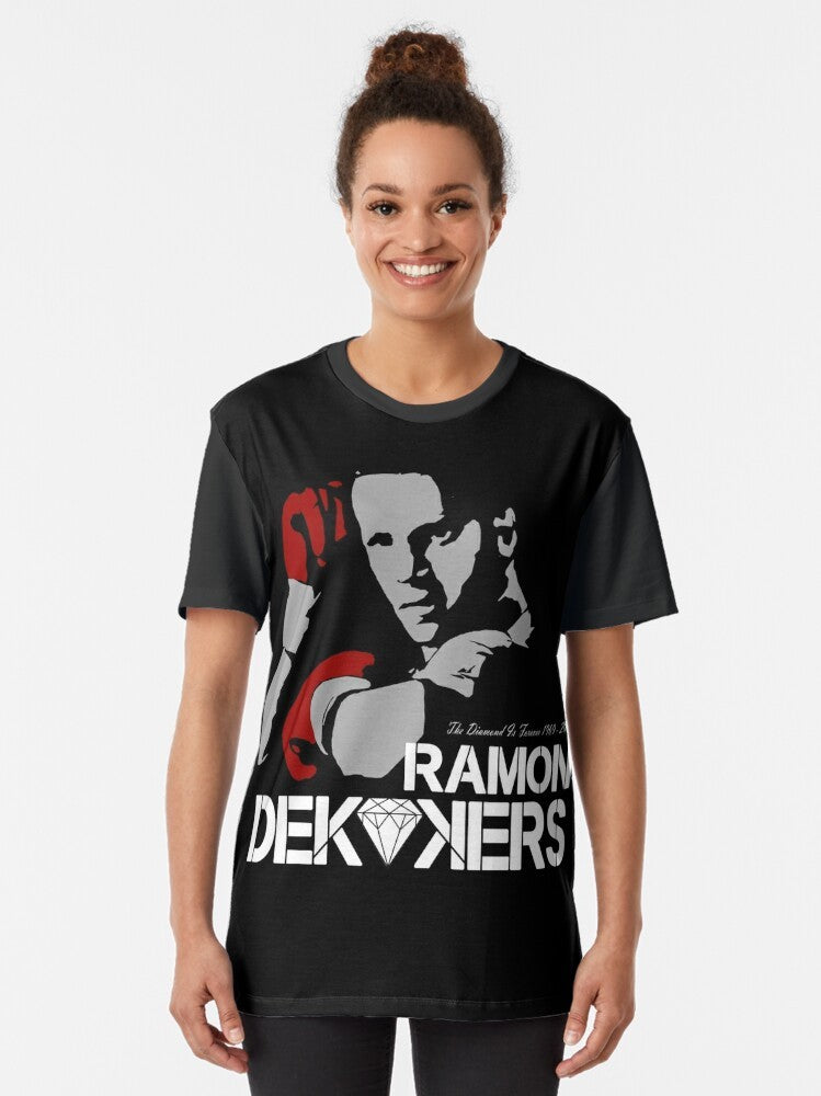 A graphic t-shirt honoring the memory of Ramon Dekkers, the legendary Dutch Muay Thai champion. - Women