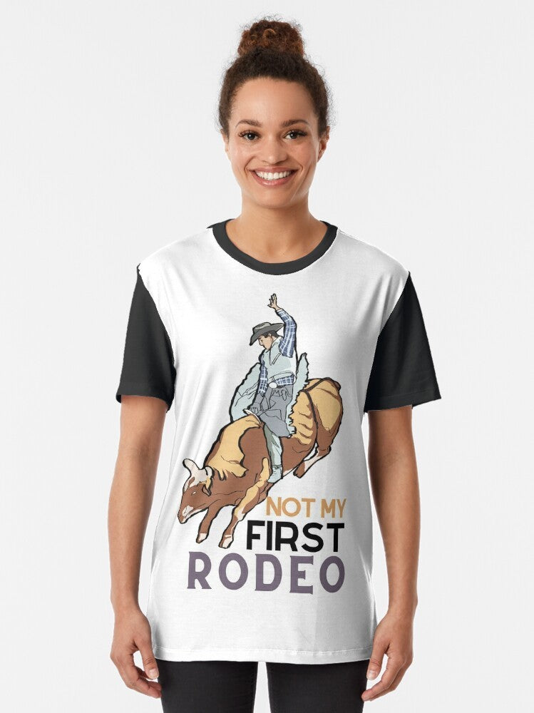 "Not My First Rodeo" graphic t-shirt with a vintage-style horse and cowboy design - Women