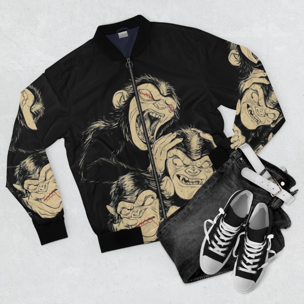 Three Wise Monkeys Bomber Jacket featuring the iconic "see no evil, hear no evil, speak no evil" imagery - Flat lay