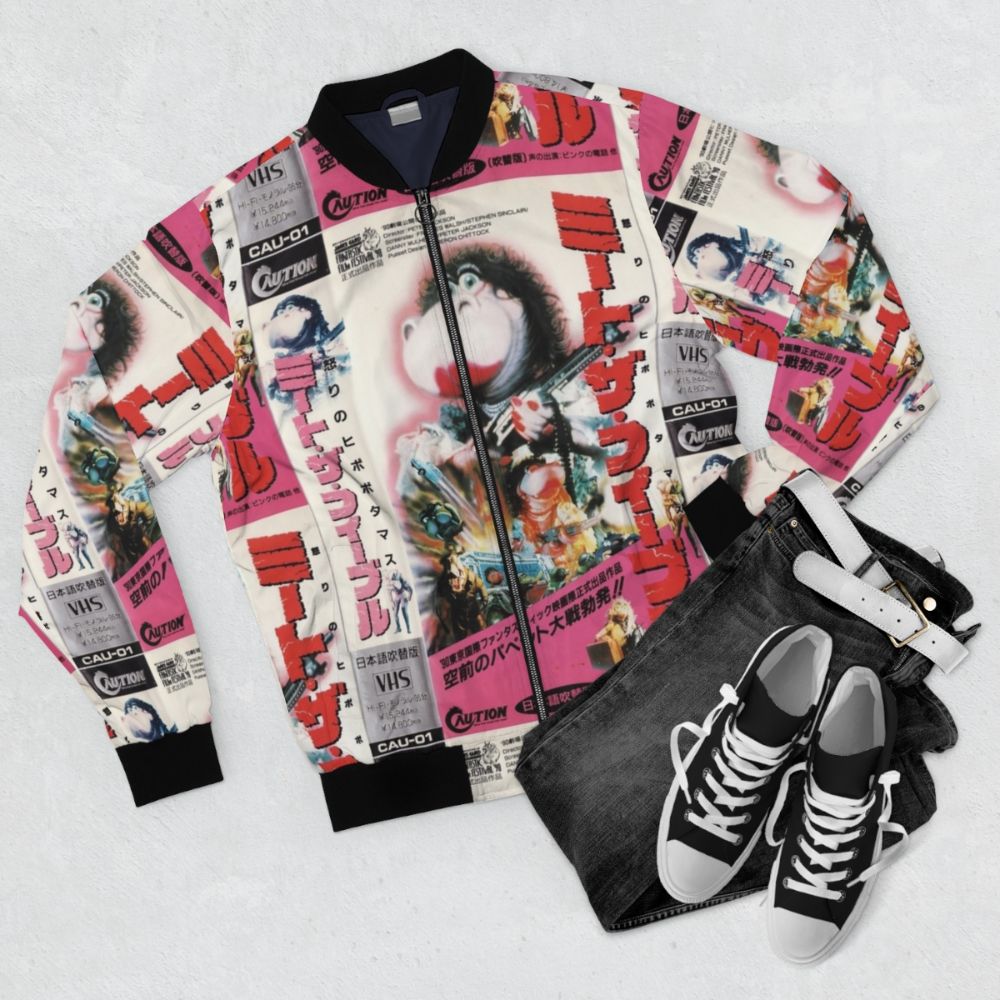 Retro "Meet The Feebles" inspired Japanese bomber jacket with a VHS cover print design - Flat lay