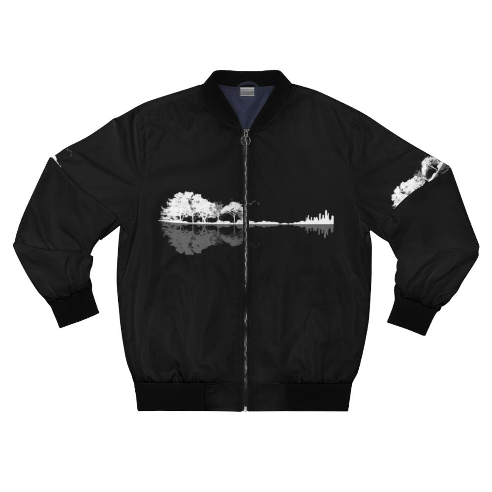 A black and white bomber jacket with a nature and guitar design for music lovers.