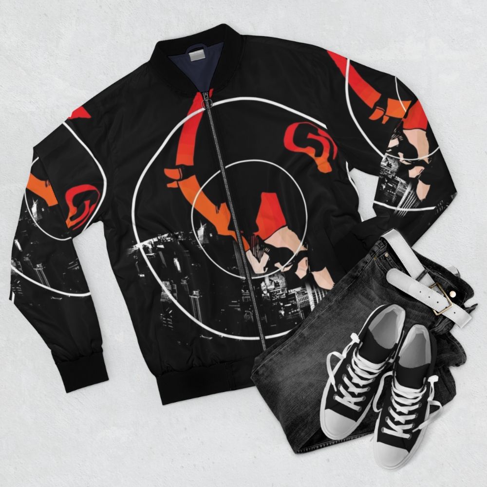 A stylish bomber jacket featuring the iconic Daredevil superhero from the Marvel comics. - Flat lay