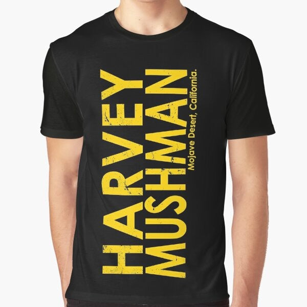 Vintage-style graphic t-shirt featuring the "Harvey Mushman" design, with a classic motorcycle and desert racing theme.