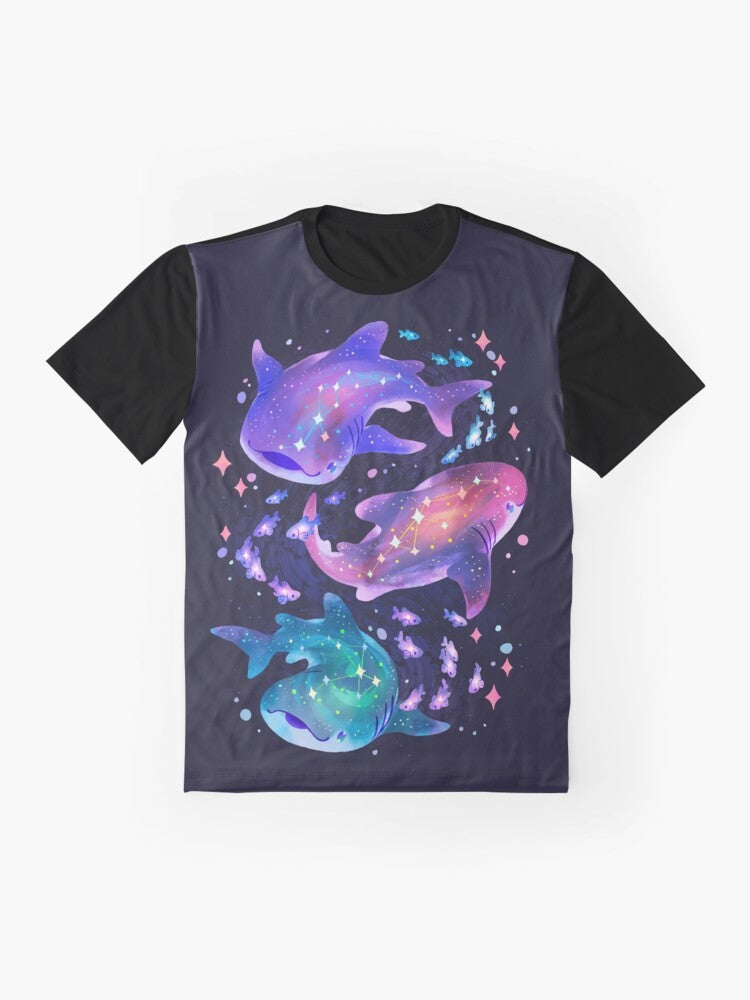 A cosmic-themed t-shirt design featuring a purple whale shark swimming among the stars. - Flat lay