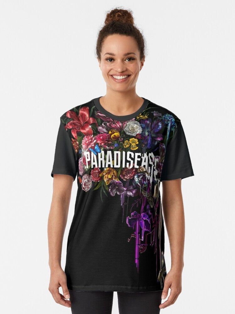 A graphic t-shirt featuring a glitched, floral paradise design with sci-fi and reality elements. - Women