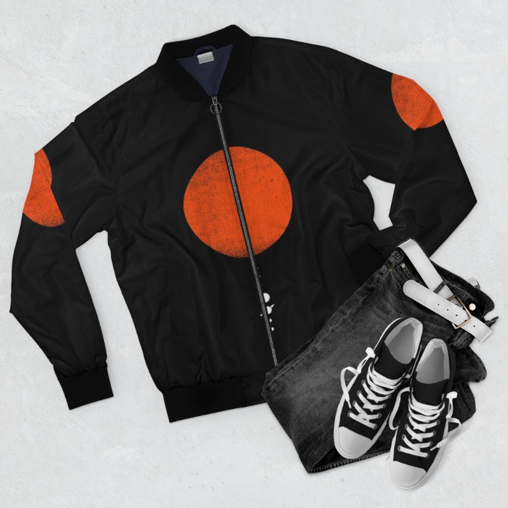 Minimal bomber jacket featuring a solar system design with planets - Flat lay