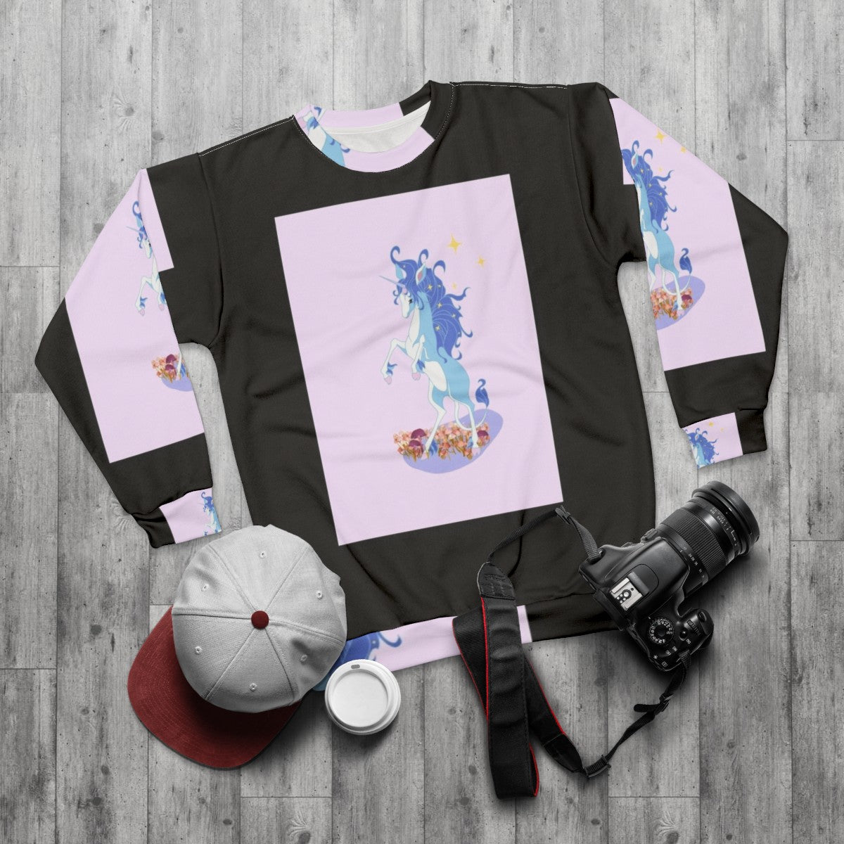 The Last Unicorn Sweatshirt featuring a whimsical unicorn design - flat lay