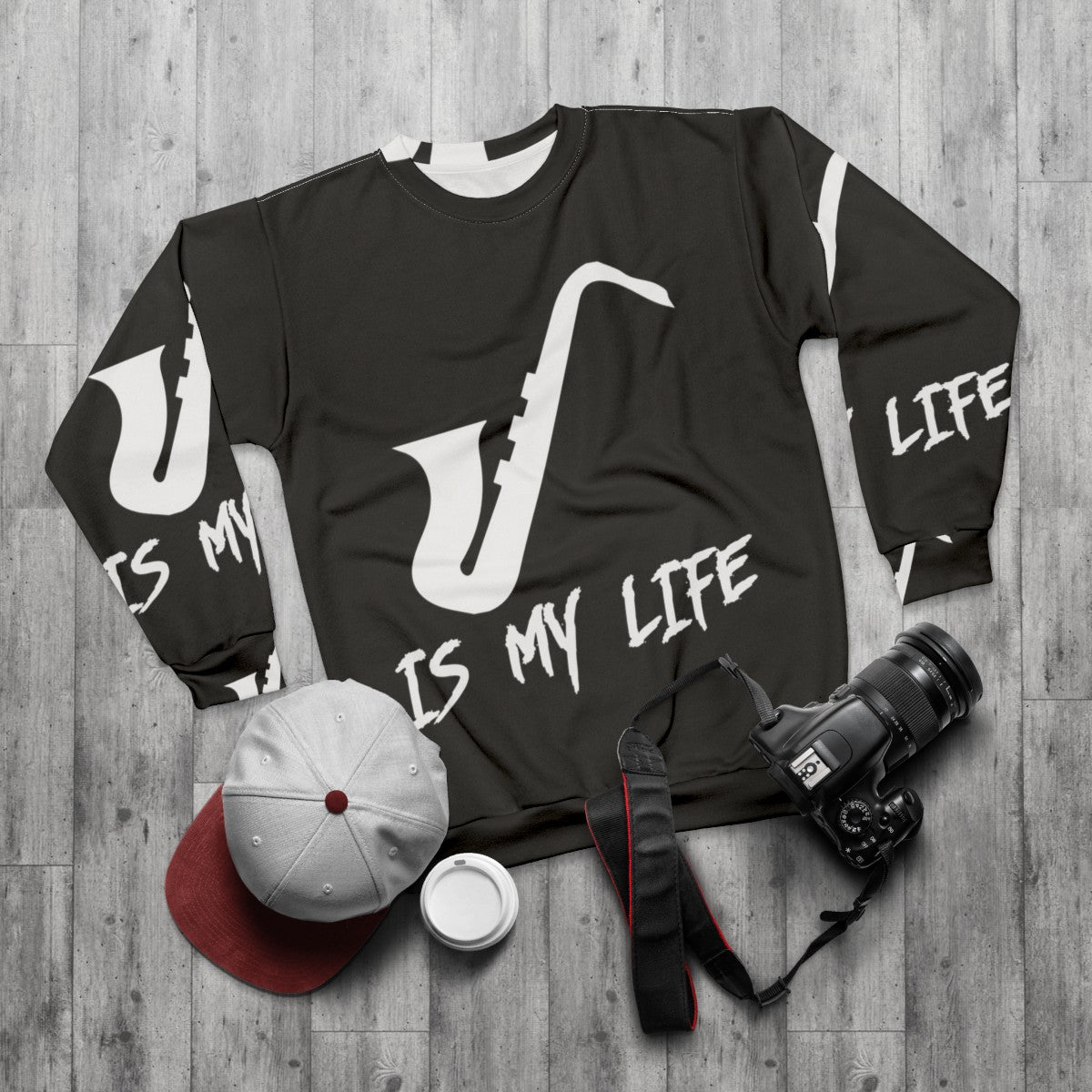 Man wearing saxophone sweatshirt, saxophone-themed apparel - flat lay