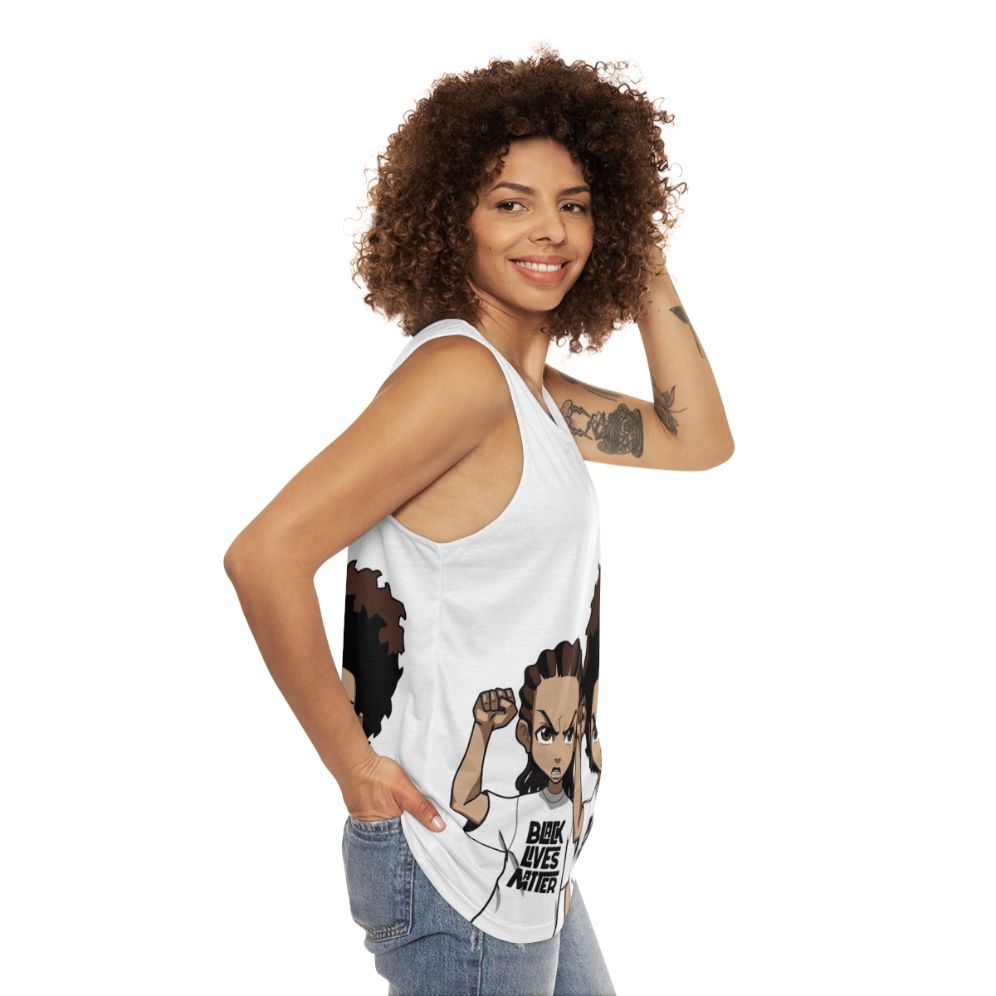 Riley and Huey Freeman Protesting Black Power Fist Unisex Tank Top - women side