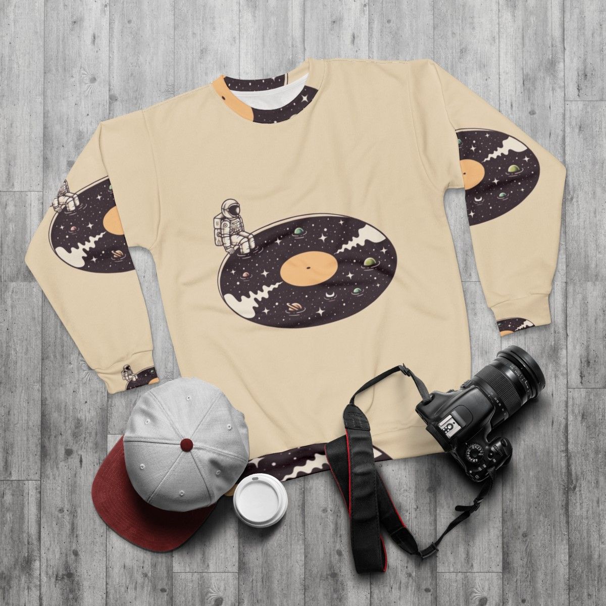 Cosmic Sound Sweatshirt with Astronaut and Space Themed Design - flat lay