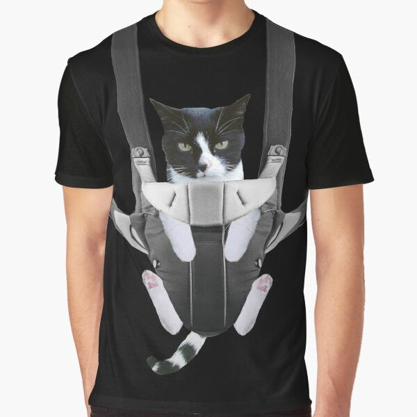 A graphic t-shirt design featuring a cute cat in a baby carrier