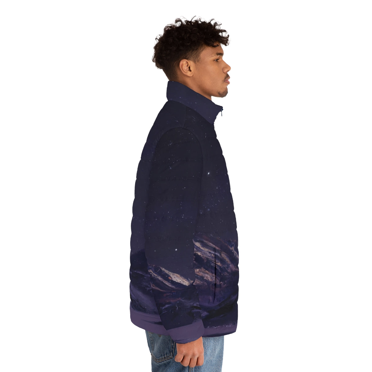 Person wearing a puffer jacket standing in front of a starry night sky and mountains - men side right