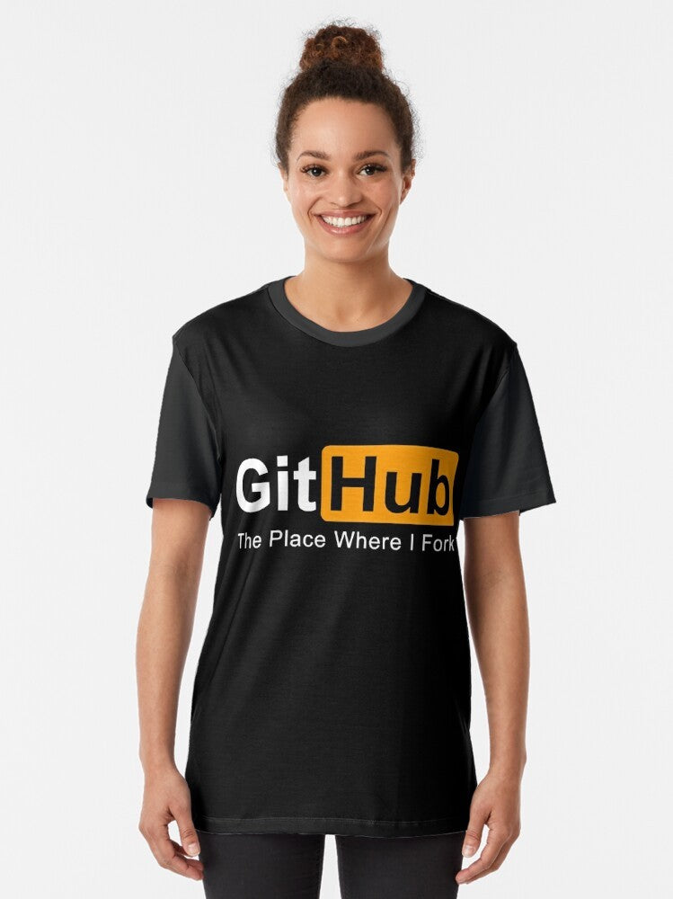 Graphic t-shirt featuring the text "GitHub: The Place Where I Fork Programming" - Women