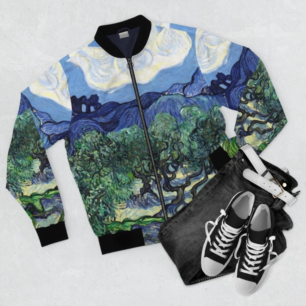 Bomber jacket featuring Vincent van Gogh's famous painting "Olive Trees with the Alpilles in the Background" - Flat lay