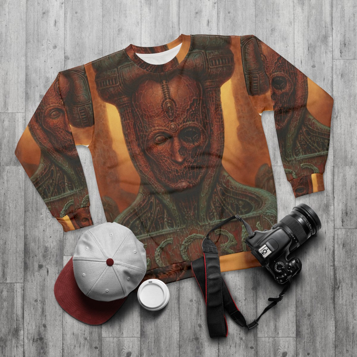 Scorn Game Sweatshirt featuring horror-inspired creature design - flat lay