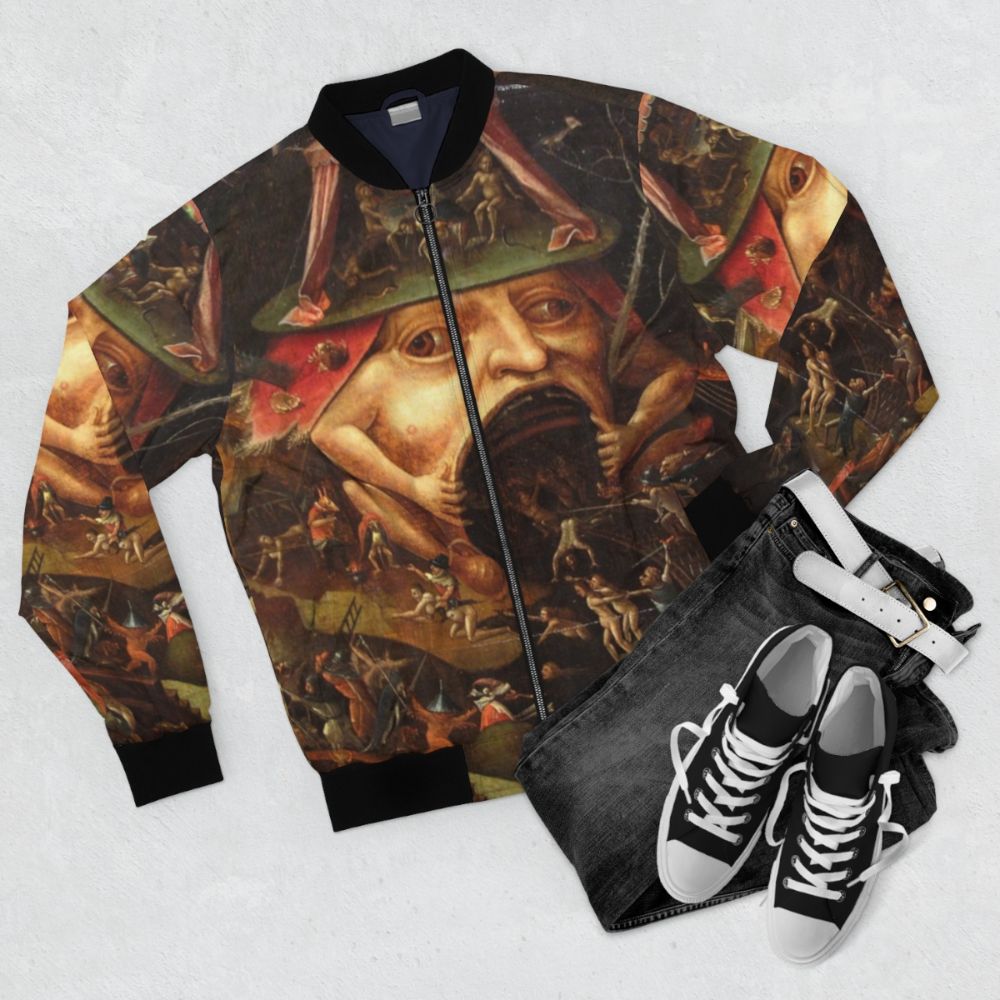 Bomber jacket featuring artwork from Hieronymus Bosch's "The Garden of Earthly Delights" depicting the hellish scenes of the underworld. - Flat lay