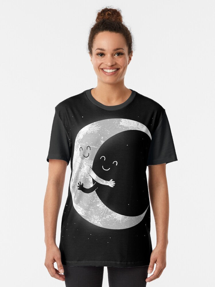 A black and white graphic t-shirt featuring a cute smiley moon design for space and astronomy enthusiasts. - Women