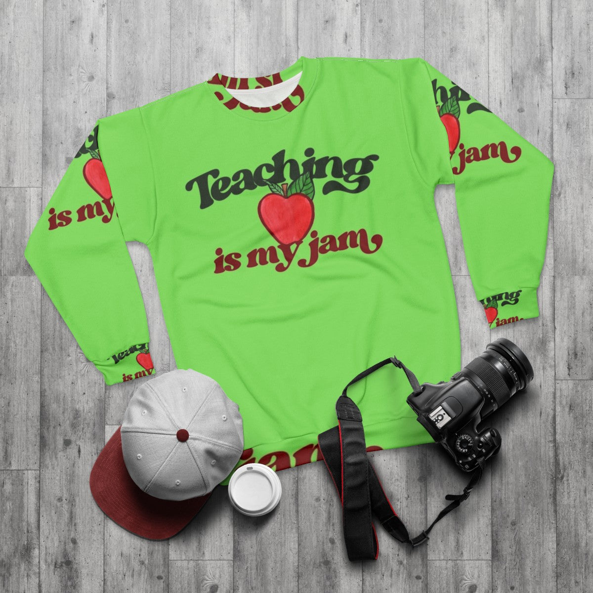 "Teaching Is My Jam" Sweatshirt with Red Apple Graphic - flat lay