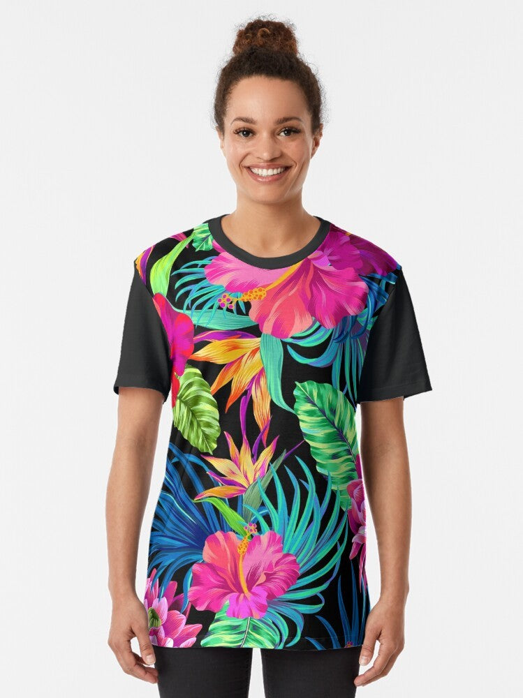 Tropical hibiscus flower graphic t-shirt with a bold, colorful floral pattern design. - Women