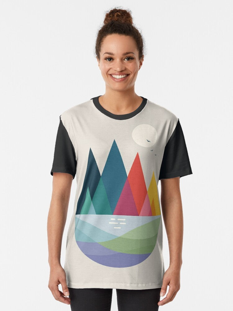 Vibrant and colorful graphic t-shirt featuring a landscape dream with a rainbow and geometric elements - Women