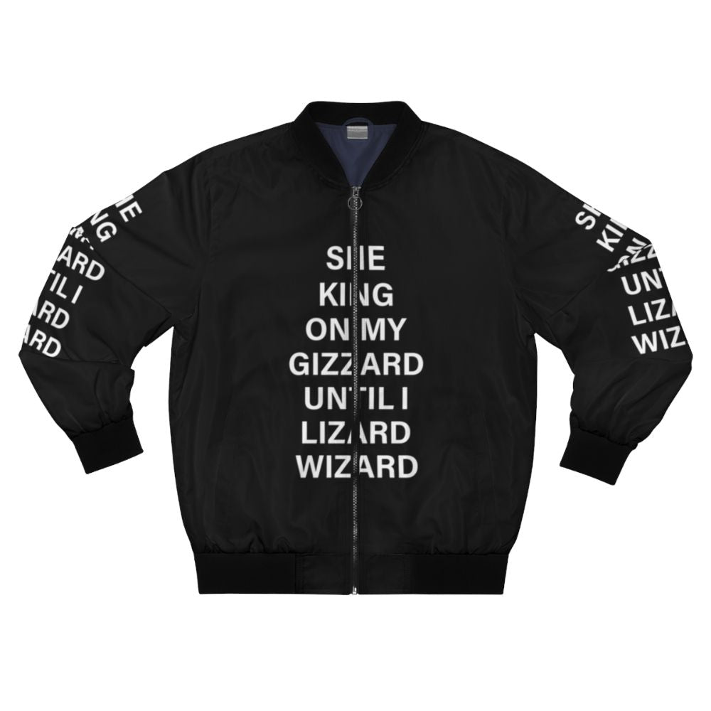 Black bomber jacket with the text "She King on My Gizzard Until I Lizard Wizard" printed on it, a funny meme design featuring a lizard and wizard.