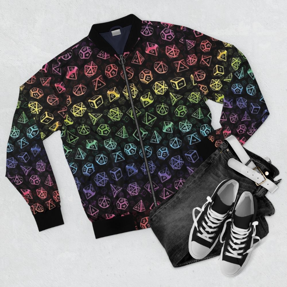 A colorful bomber jacket featuring a D20 dice and Dungeons and Dragons inspired pattern in a rainbow of colors. - Flat lay