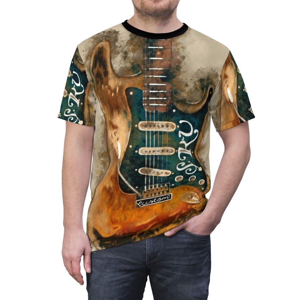 A stylized t-shirt design featuring an electric guitar with a watercolor effect, inspired by the legendary blues guitarist Stevie Ray Vaughan. - men front