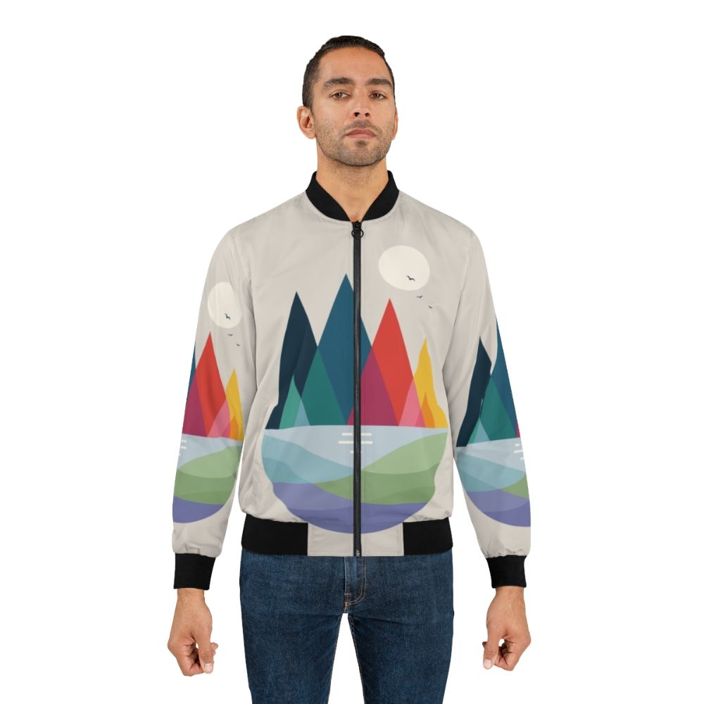 Colorful and geometric landscape bomber jacket with rainbow, green, red, yellow, orange, blue, purple, and pink colors - Lifestyle