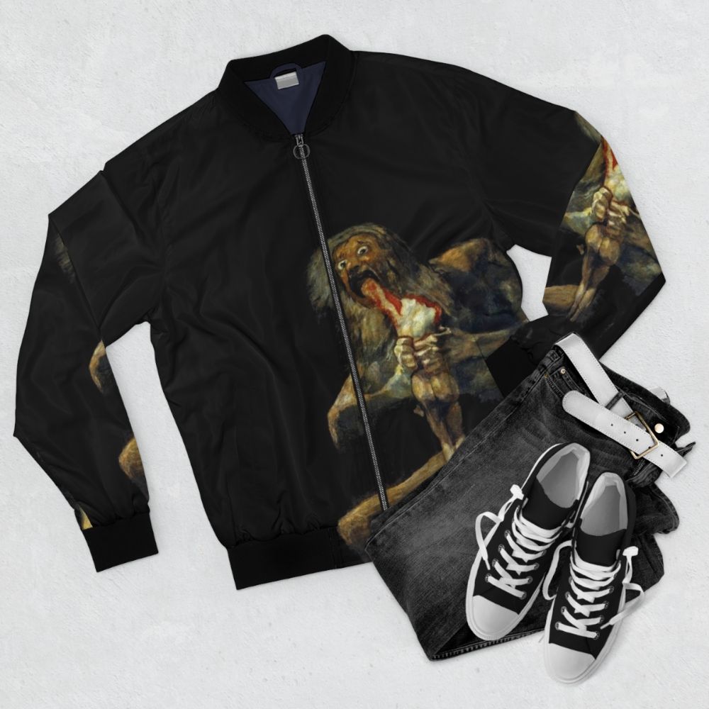 Saturn Devouring His Son Bomber Jacket featuring the famous painting by Francisco Goya - Flat lay