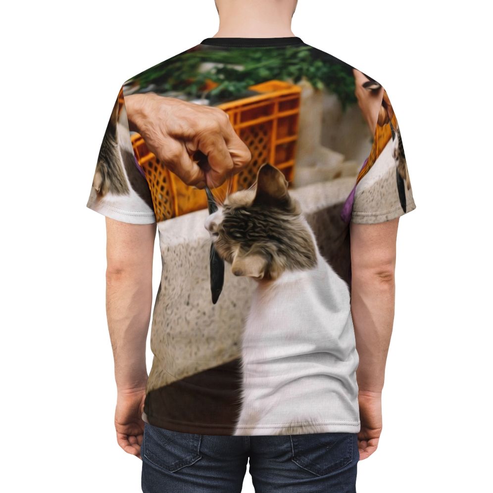 Illustration of people, market, animals, and cats on a t-shirt - men back