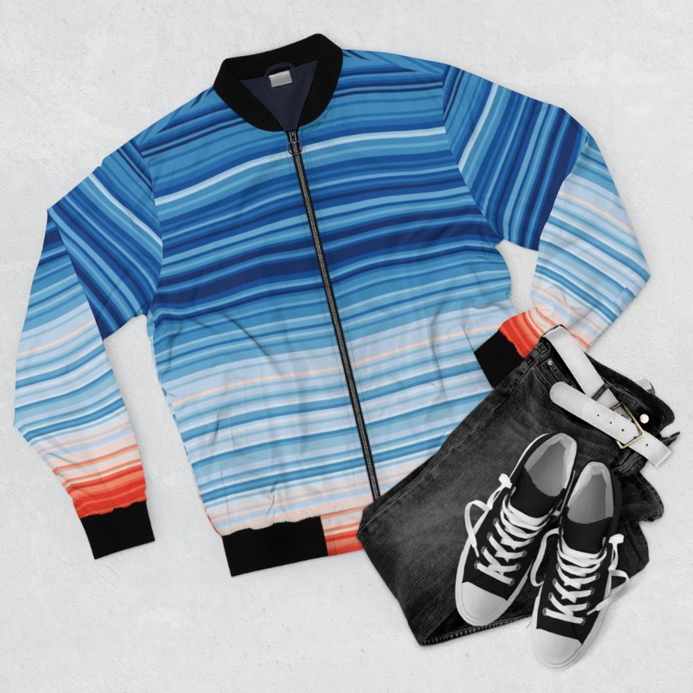 Warm striped bomber jacket with climate change awareness graphics - Flat lay