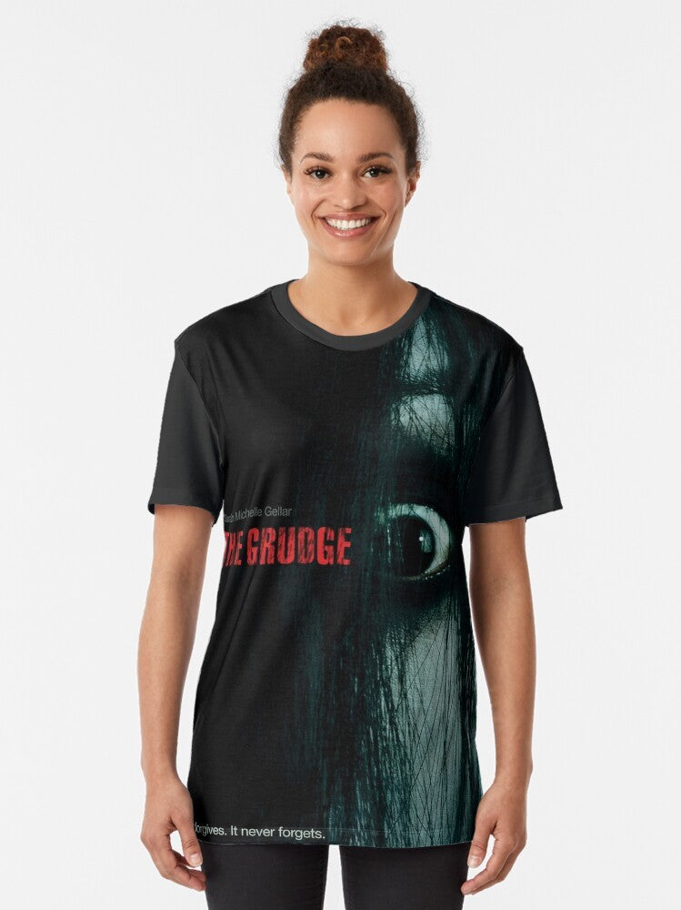 "The Grudge Movie Graphic T-Shirt - Horror themed apparel featuring a spooky ghost design" - Women