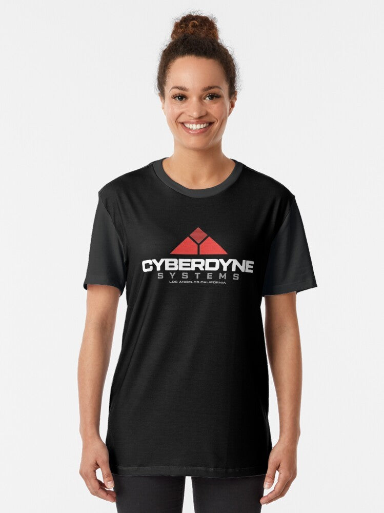 A graphic t-shirt featuring the Cyberdyne Systems Corporation logo and Terminator imagery, representing the sci-fi and artificial intelligence themes. - Women